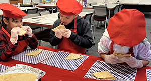 Three students eating