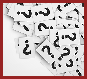 scattered pile of question marks on cards